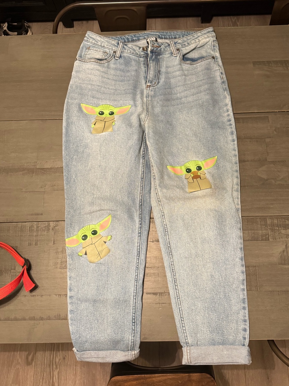 Light Wash Women’s Jeans featuring Grogu